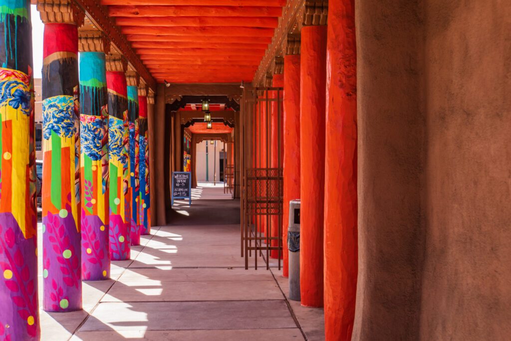 Colorfully painted columns on the plaza in Santa Fe, New Mexico.